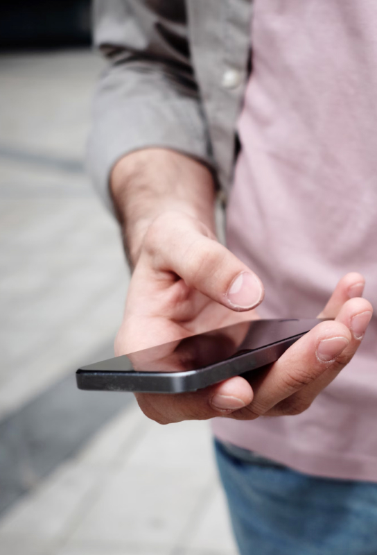 man-holding-phone-in-hand
